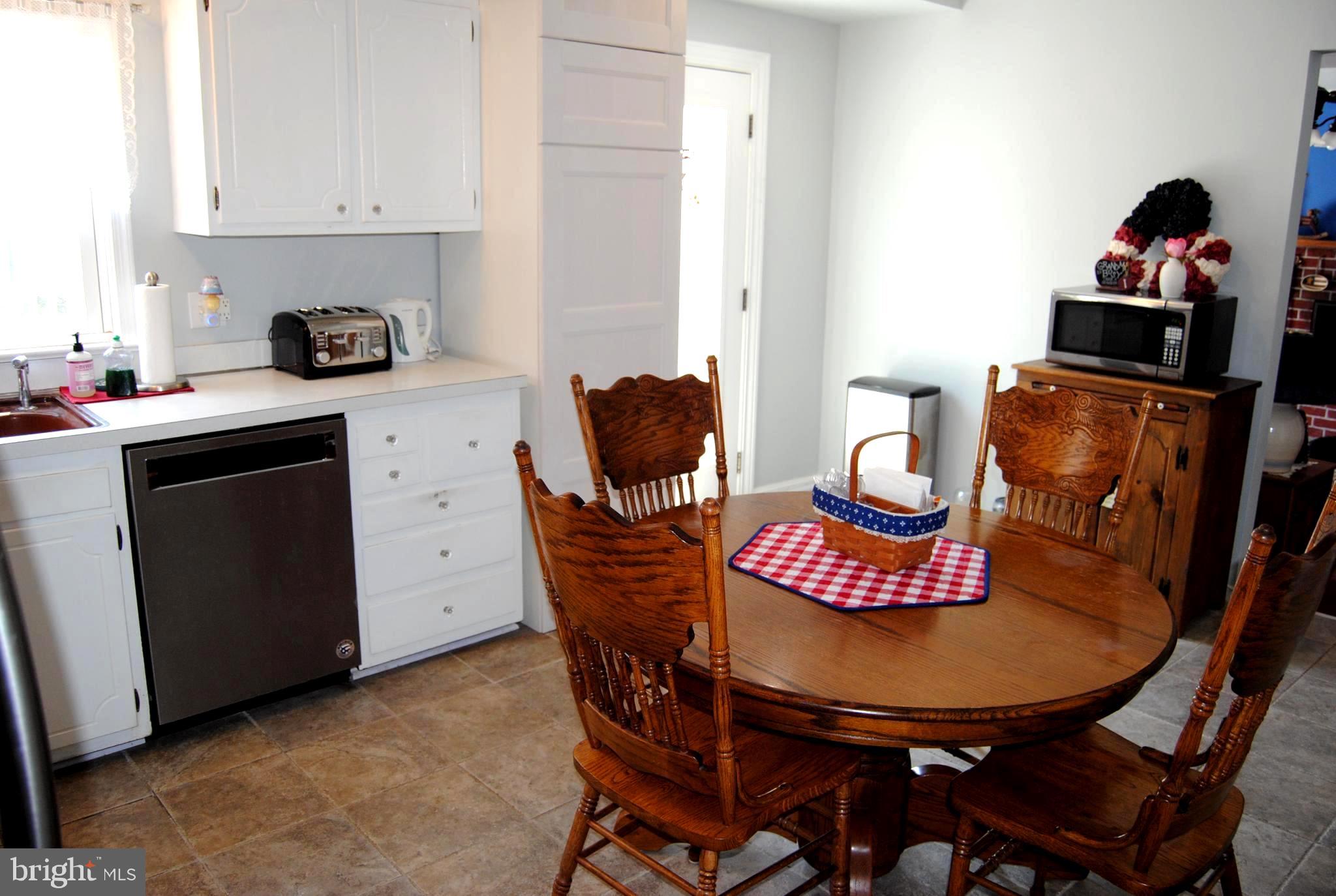716 Meadowlark Road Norristown, PA 19403 - Photo 8 of 23 Kitchen with access to the deck