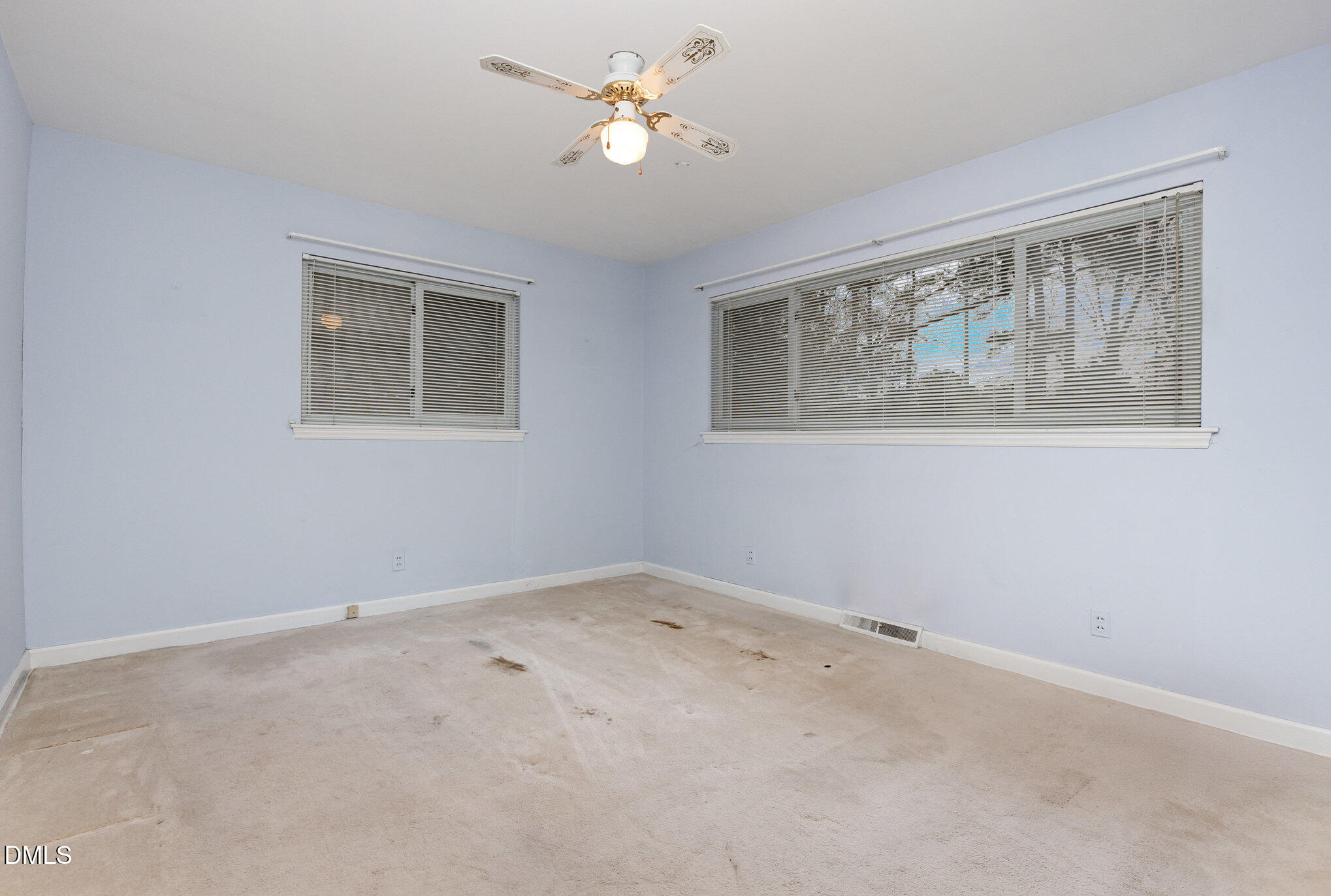 615 Horton Road Durham, NC 27704 - Photo 10 of 19 a view of an empty room with a window
