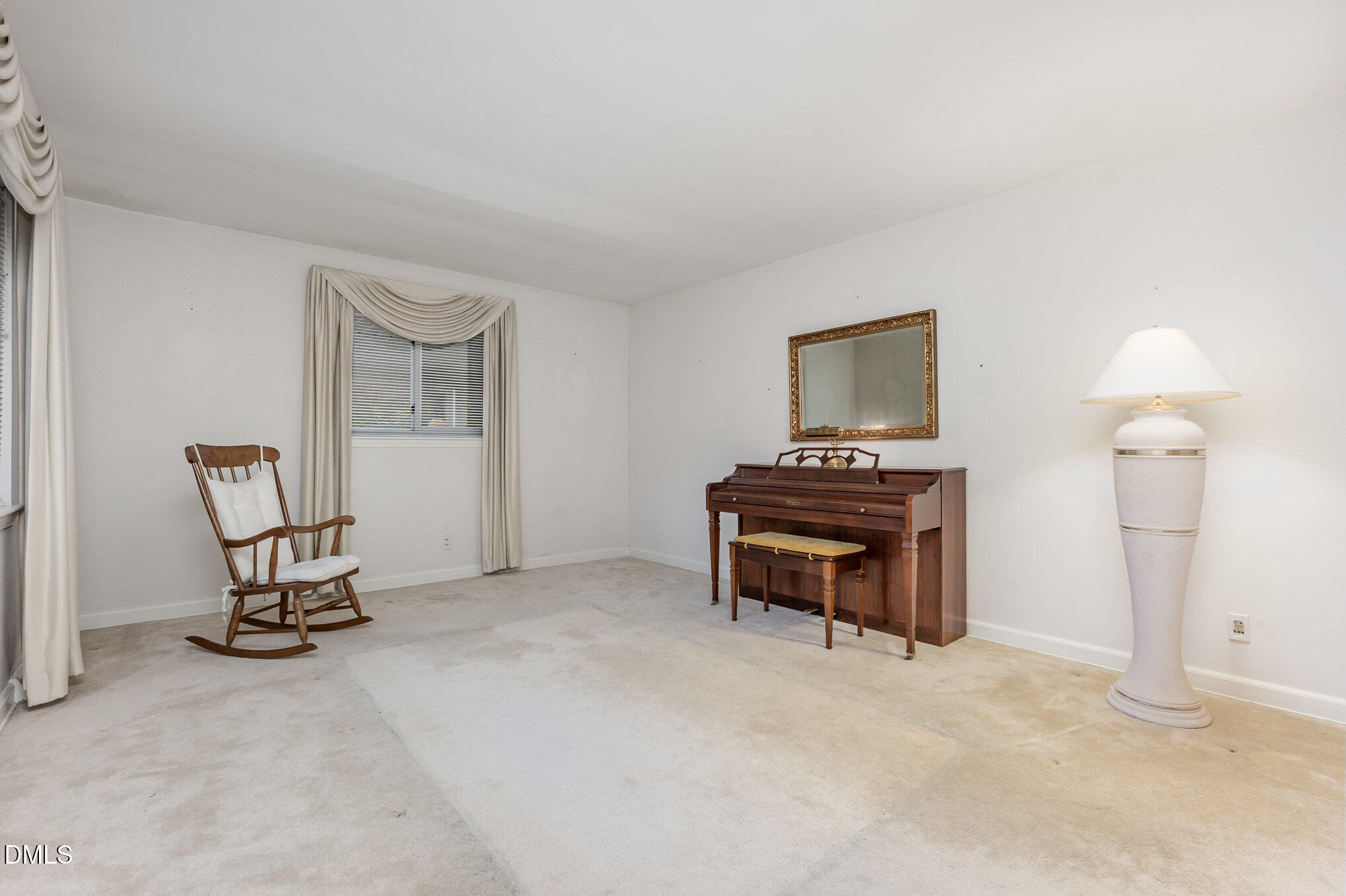 615 Horton Road Durham, NC 27704 - Photo 2 of 19 a view of a workspace with furniture