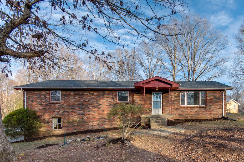 103 Cardinal Road Dickson, TN 37055 - Photo 3 of 24 a front view of a house with a yard