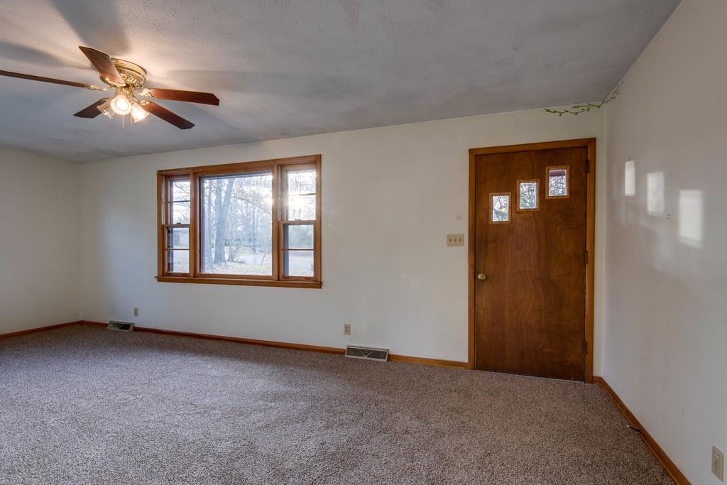 103 Cardinal Road Dickson, TN 37055 - Photo 6 of 24 an empty room with windows and fan