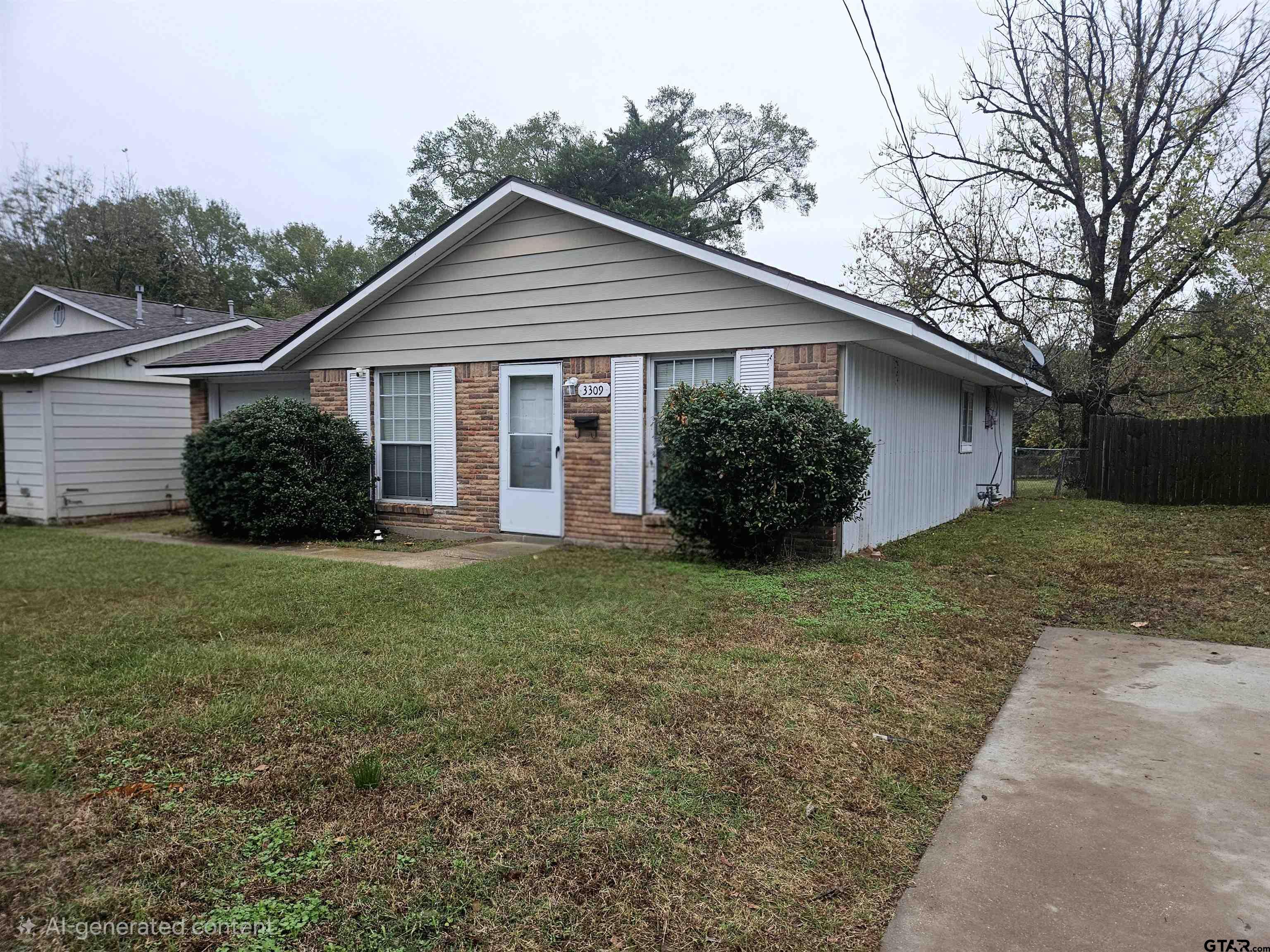 3309 North Luberta Street Tyler, TX 75702 - Photo 2 of 14 a view of a house with yard and a garden