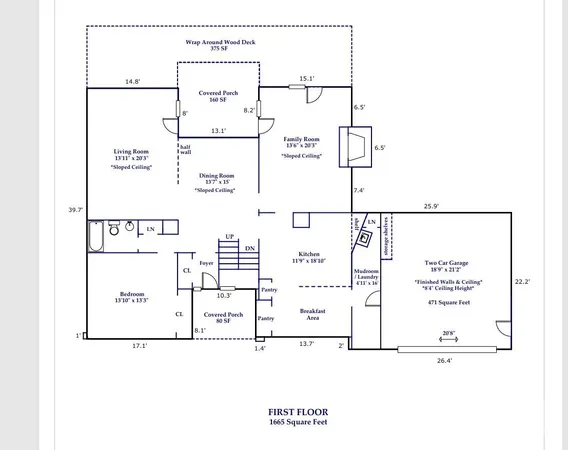 a view of a livingroom with furniture and a window