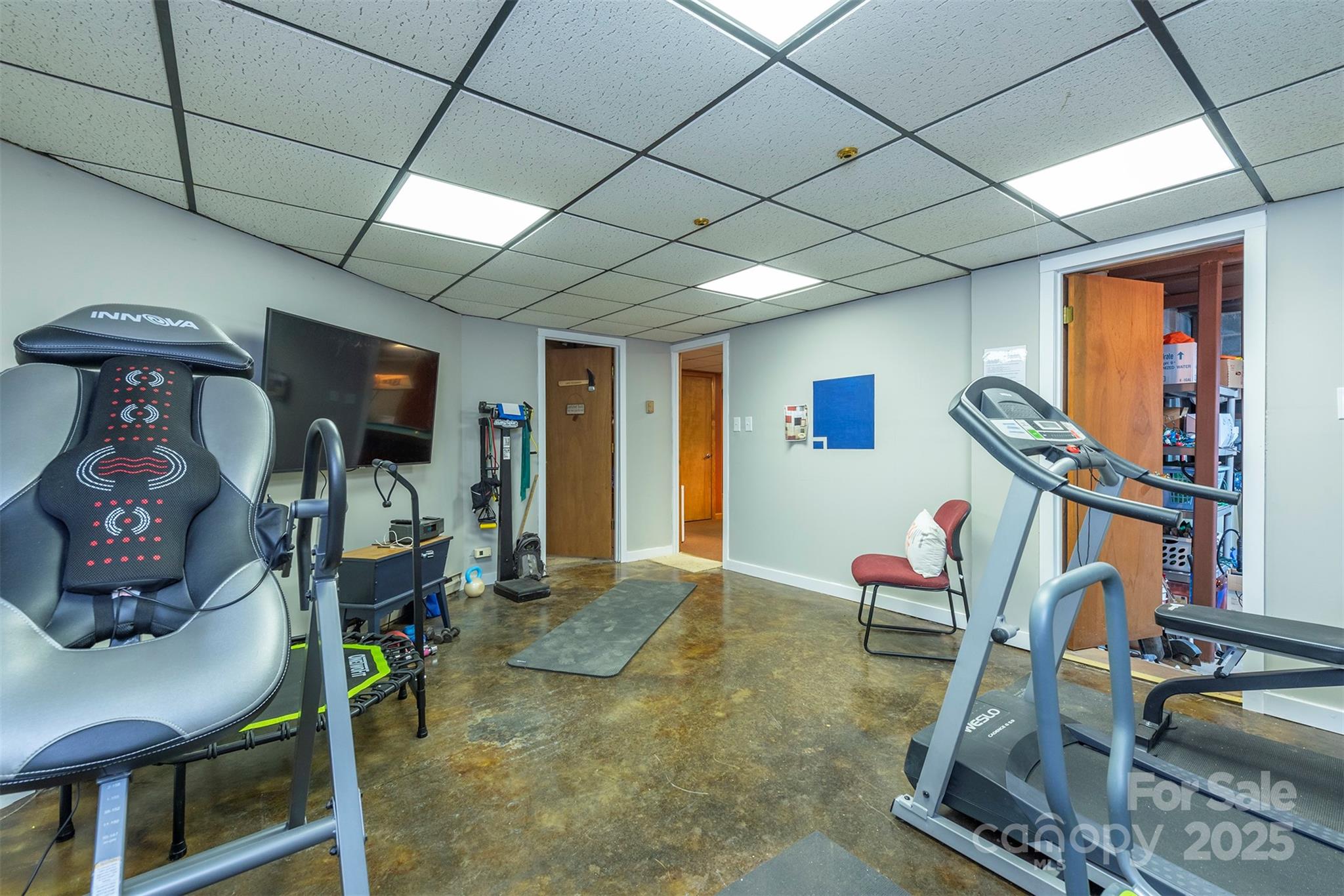 10 Chestnut Ridge Road Mills River, NC 28759 - Photo 26 of 47 a room with lots of furniture and windows