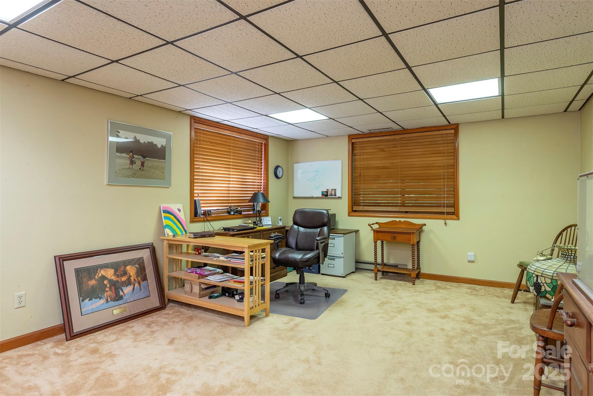 10 Chestnut Ridge Road Mills River, NC 28759 - Photo 27 of 47 a room with furniture and a window