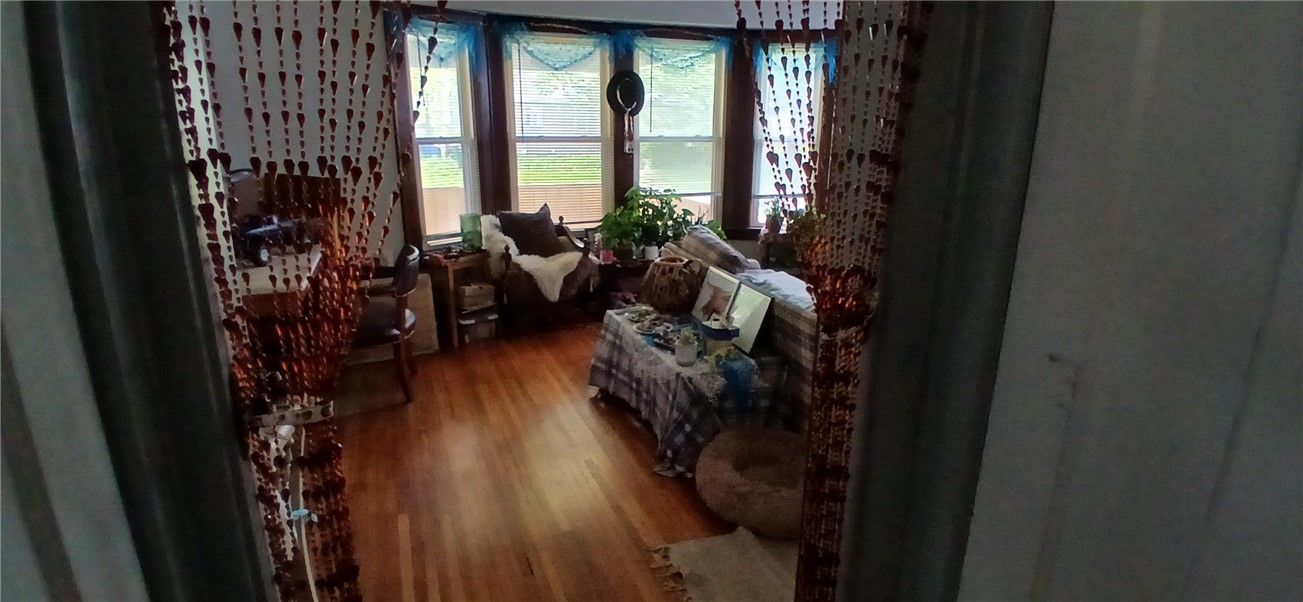 54 Berry Street Rochester, NY 14609 - Photo 29 of 40 living room with gumwood trim