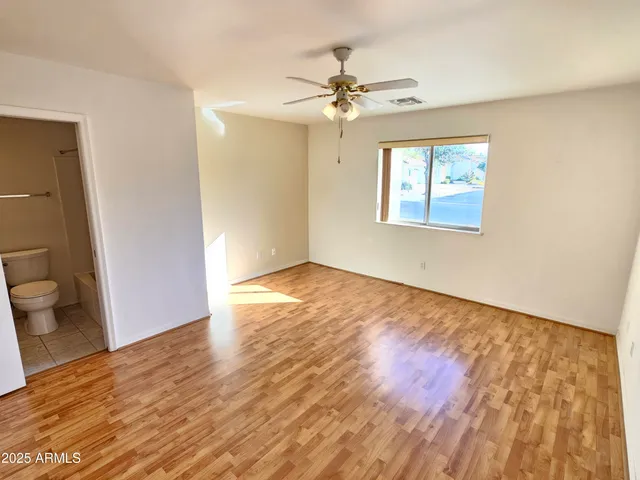 a view of an empty walk in closet