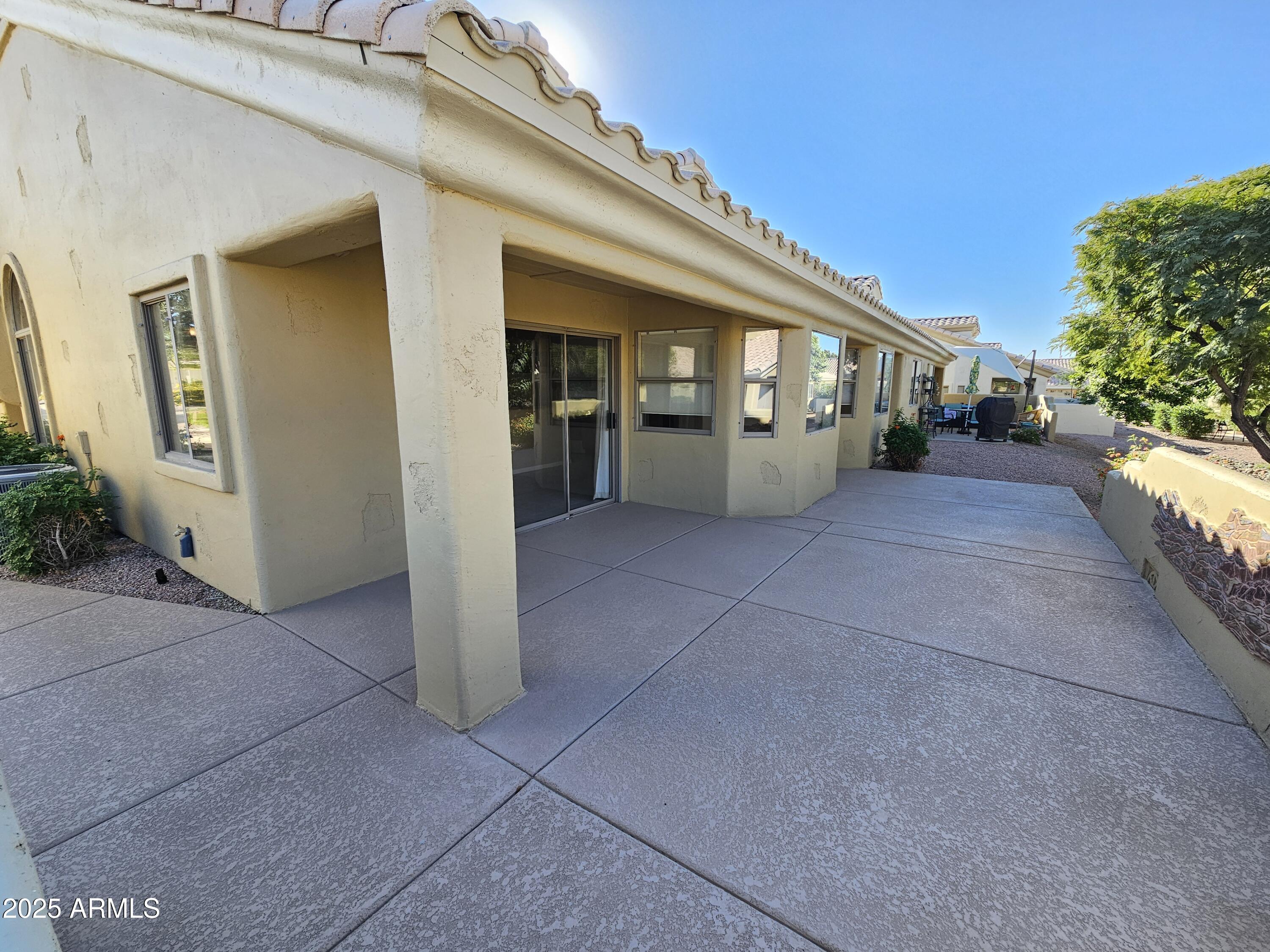 5830 East McKellips Road, Unit 139 Mesa, AZ 85215 - Photo 33 of 53 a view of a house with a porch