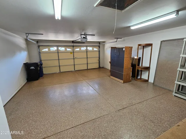 a view of a dinning table and chairs in the patio