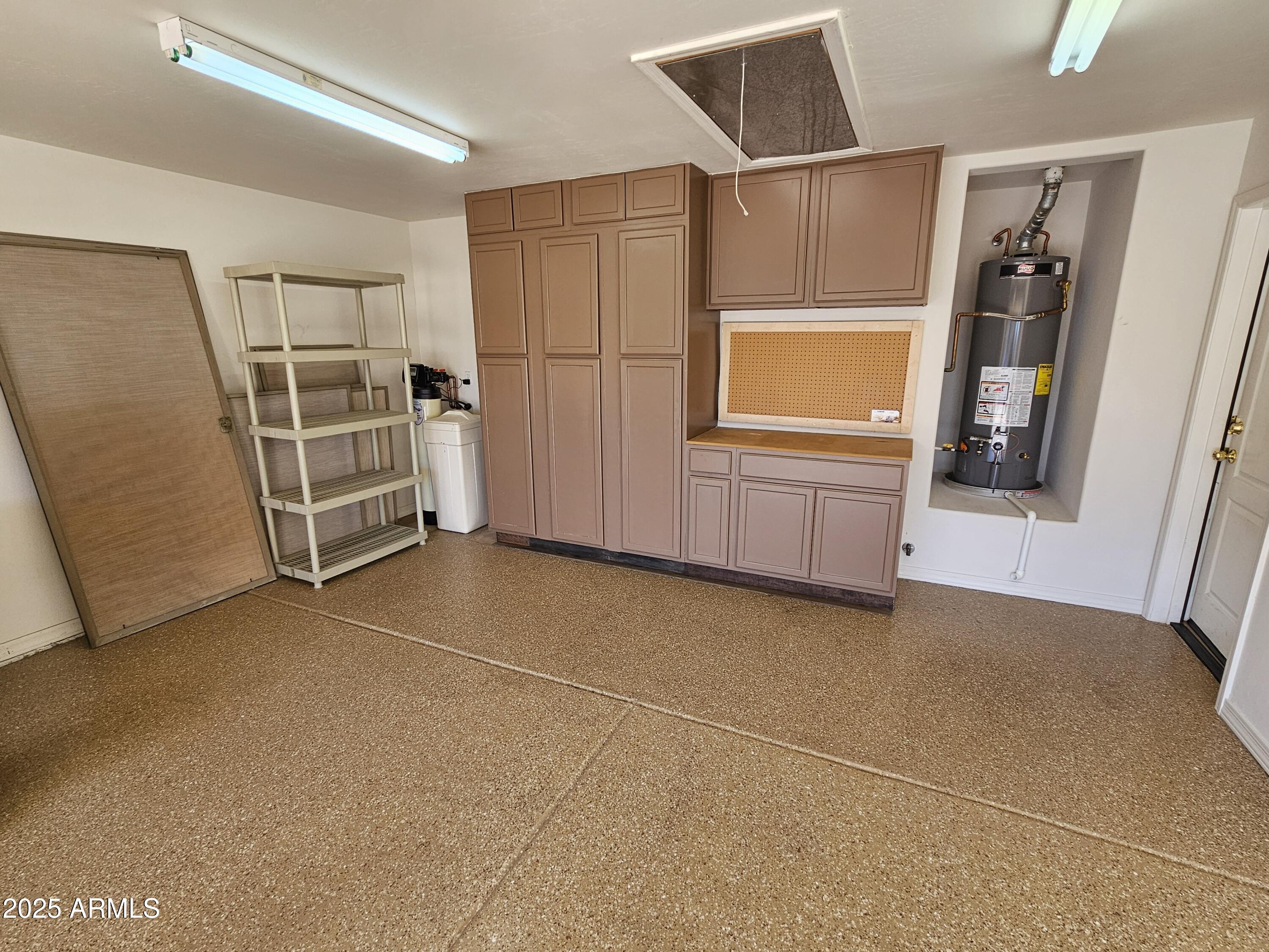 5830 East McKellips Road, Unit 139 Mesa, AZ 85215 - Photo 42 of 53 a view of a storage & utility room with fridge