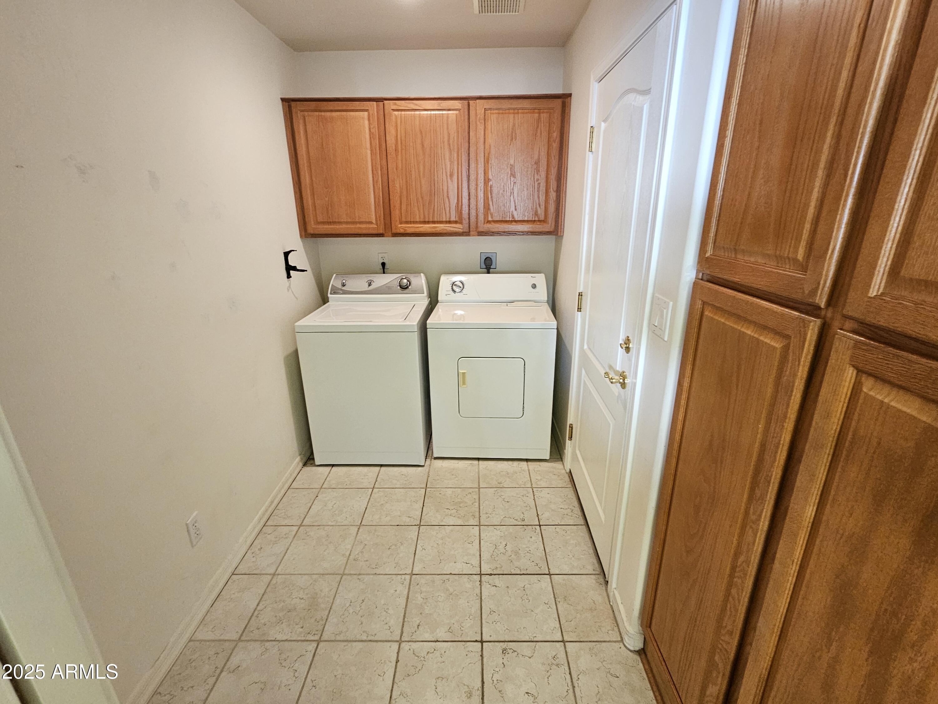 5830 East McKellips Road, Unit 139 Mesa, AZ 85215 - Photo 10 of 53 a utility room with dryer and washer