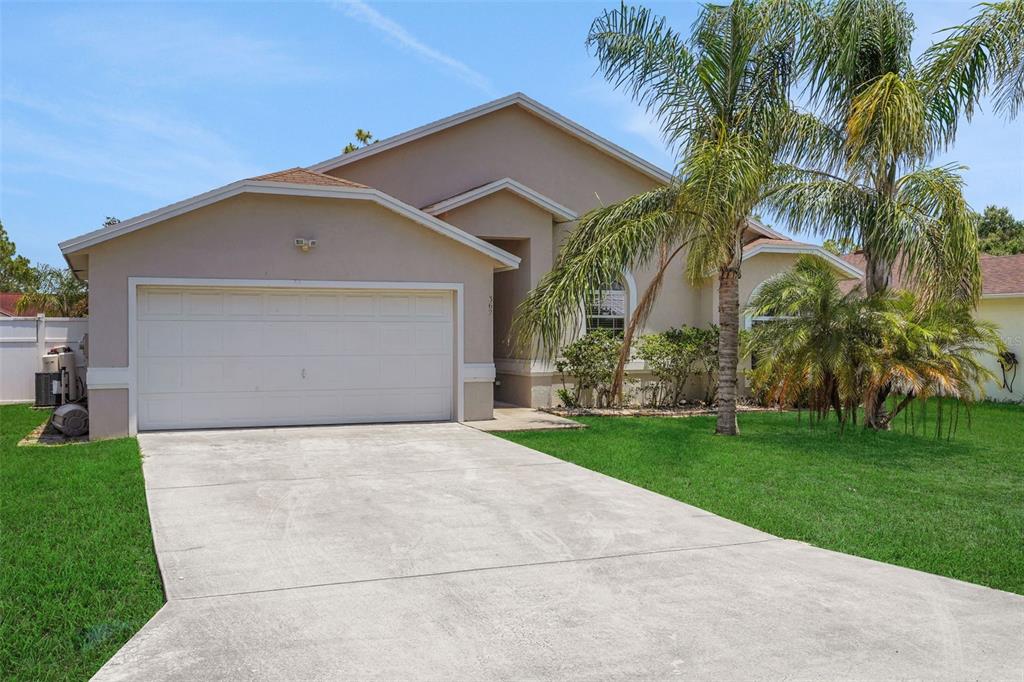 362 Lake Daisy Circle Winter Haven, FL 33884 - Photo 1 of 1 a front view of house with yard and green space