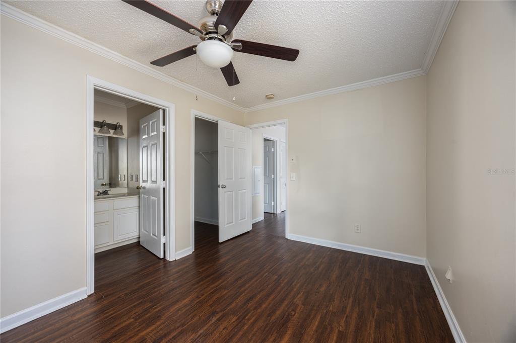 2905 Southwest Archer Road, Unit S4024 Gainesville, FL 32608 - Photo 14 of 19 a view of an empty room with wooden floor