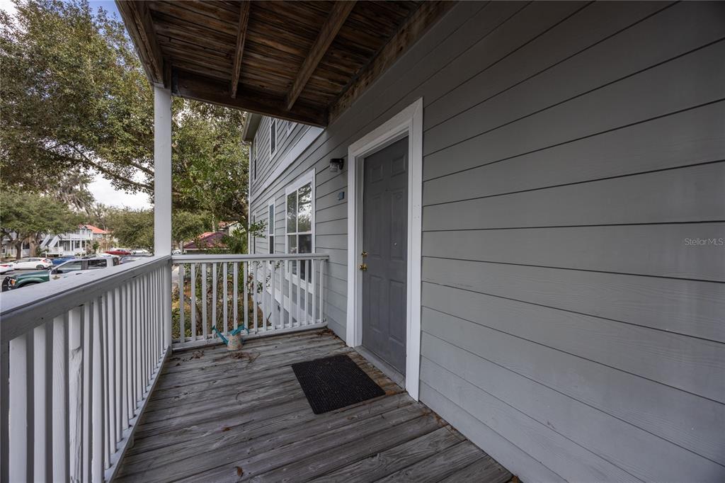 2905 Southwest Archer Road, Unit S4024 Gainesville, FL 32608 - Photo 3 of 19 a view of a balcony with wooden floor