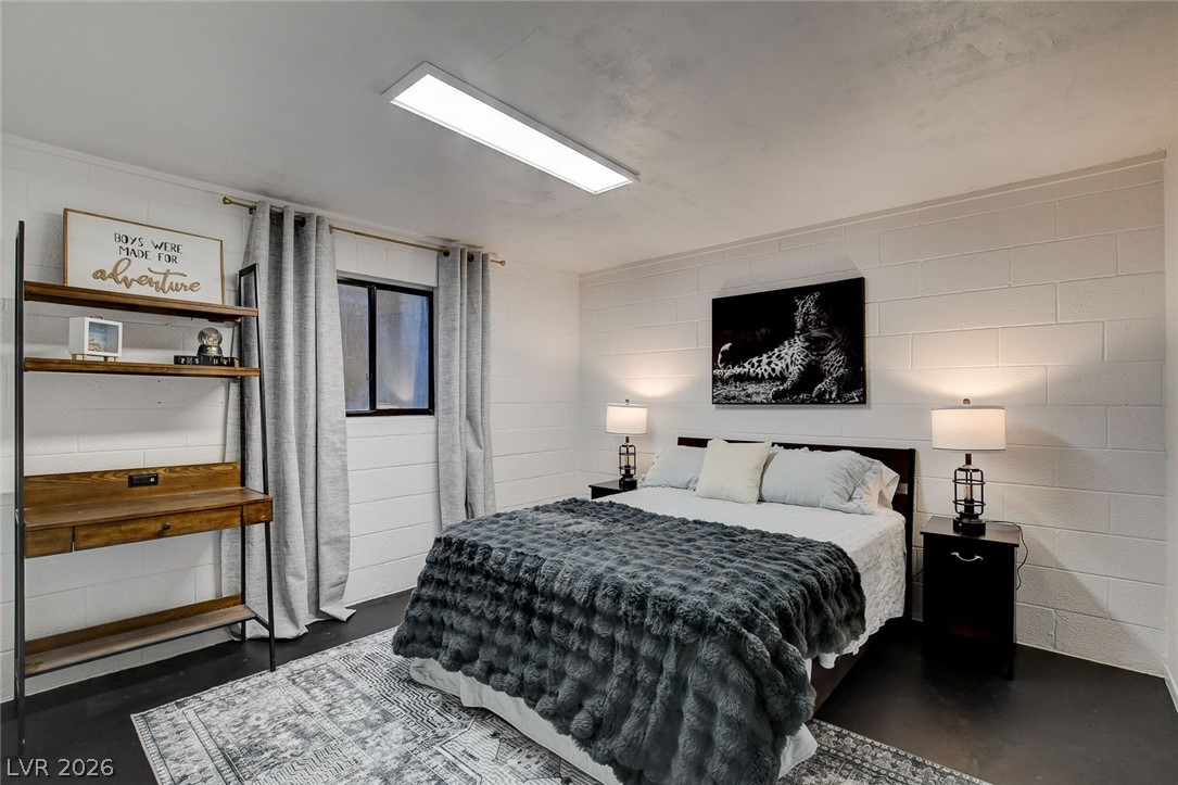 3765 Berkeley Street Logandale, NV 89021 - Photo 59 of 87 This spacious bedroom offers a tranquil retreat with ample natural light.