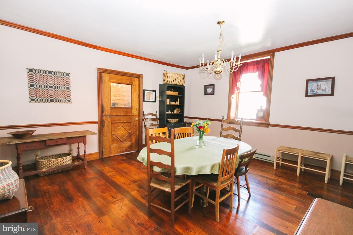 2943 Stone Road Westminster, MD 21158 - Photo 8 of 30 Featuring wood flooring & crown/chair moldings