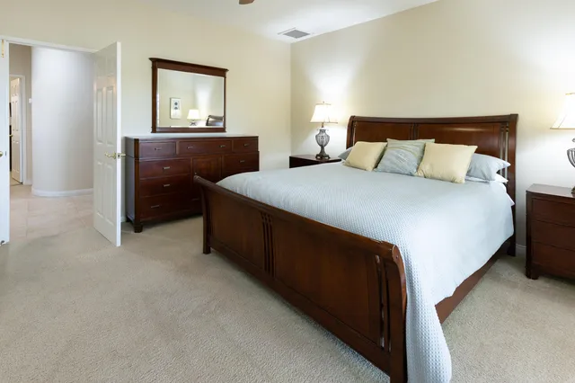 a view of walk in closet and window