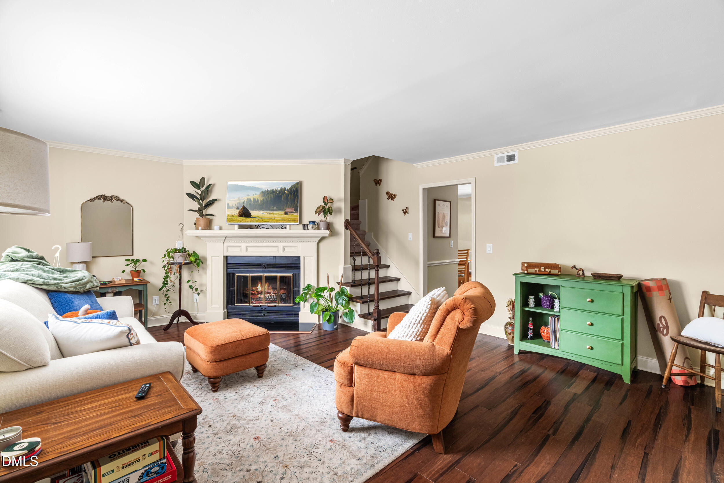 710 Powell Drive, Unit C Raleigh, NC 27606 - Photo 6 of 35 a living room with furniture and a fireplace