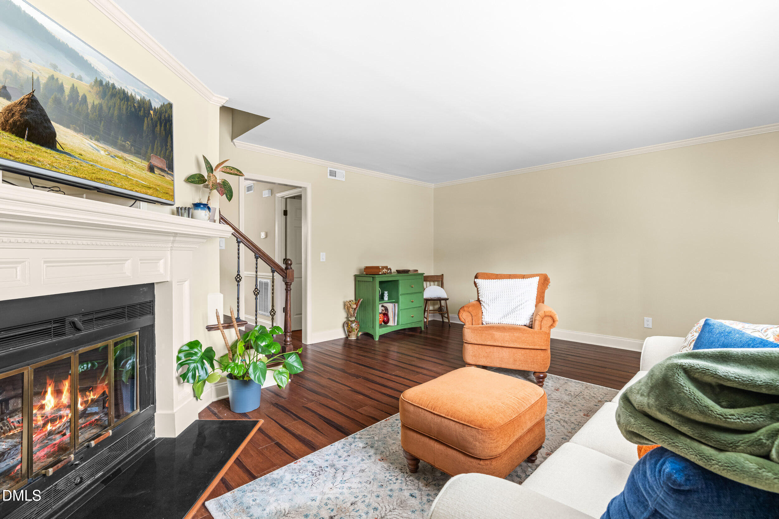 710 Powell Drive, Unit C Raleigh, NC 27606 - Photo 9 of 35 a living room with furniture and a fireplace