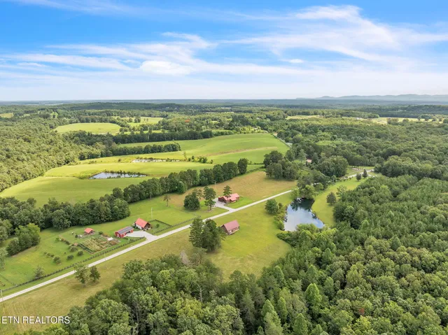 $325,000 | 319 Four Mile Creek Road, Deer Lodge, TN 37726