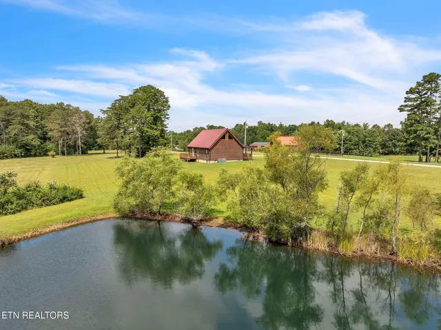 $325,000 | 319 Four Mile Creek Road, Deer Lodge, TN 37726