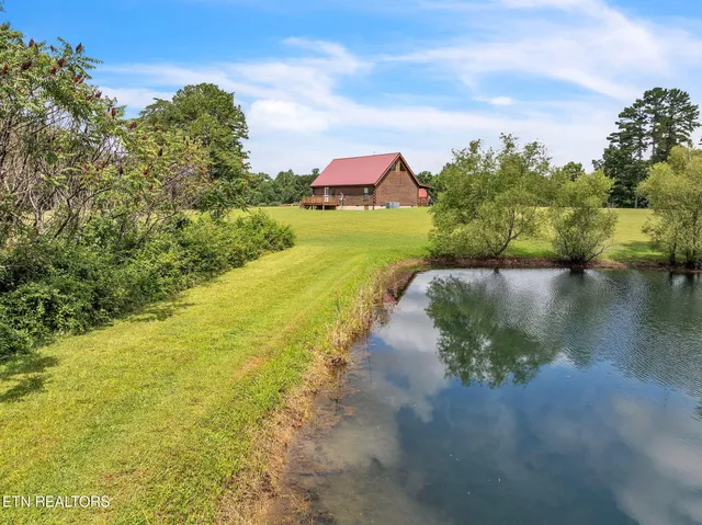 $325,000 | 319 Four Mile Creek Road, Deer Lodge, TN 37726
