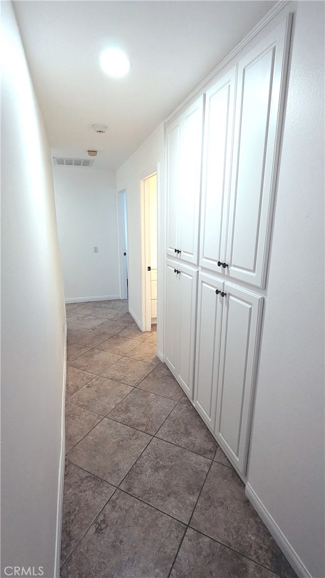 718 Vía La Paloma Riverside, CA 92507 - Photo 11 of 26 a view of a hallway and closet area