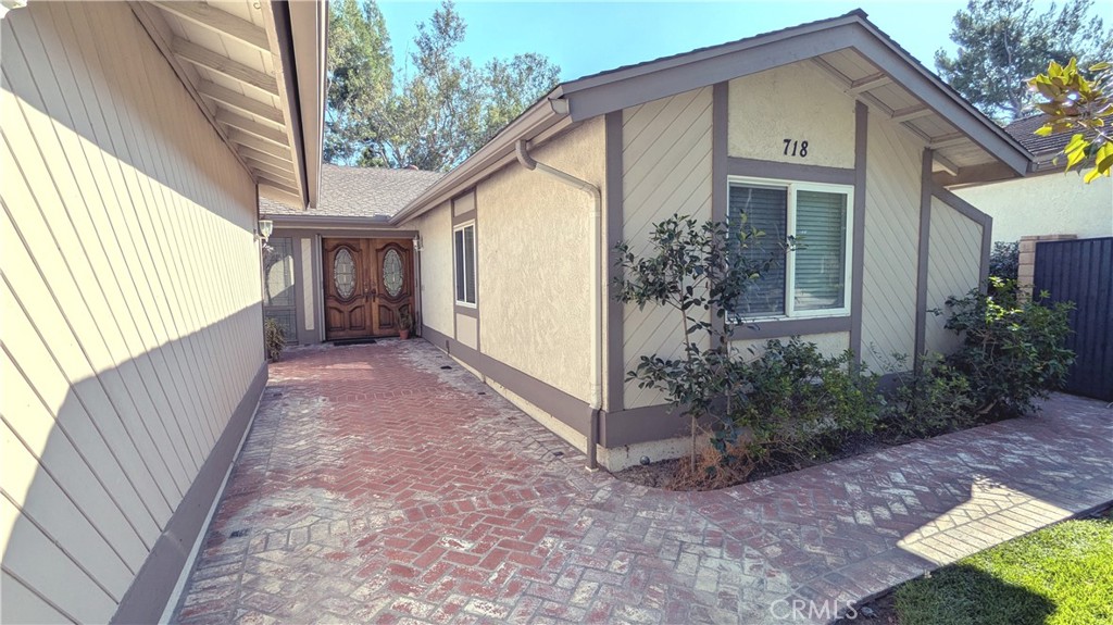 718 Vía La Paloma Riverside, CA 92507 - Photo 2 of 26 a view of a house with backyard and garden