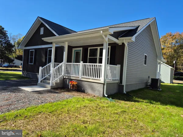 a backyard of a house with a deck and deck