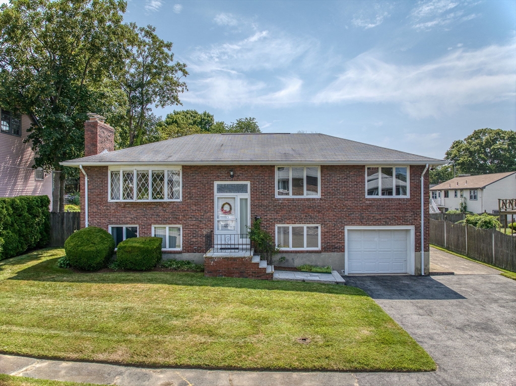 5 Christopher Drive Nahant, MA 01908 - Photo 1 of 1 a front view of a house with garden