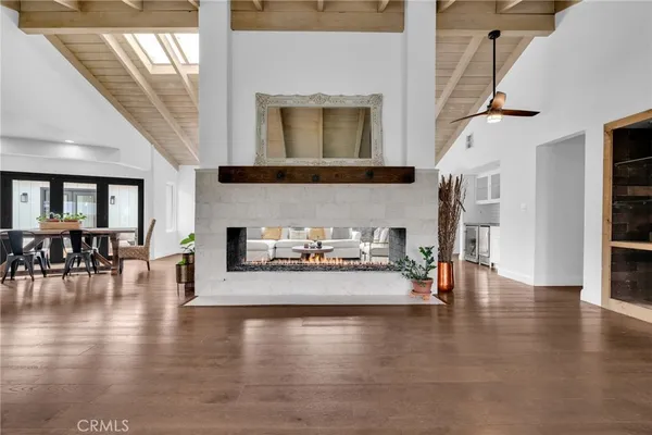 a kitchen with stainless steel appliances granite countertop a sink and stove top oven
