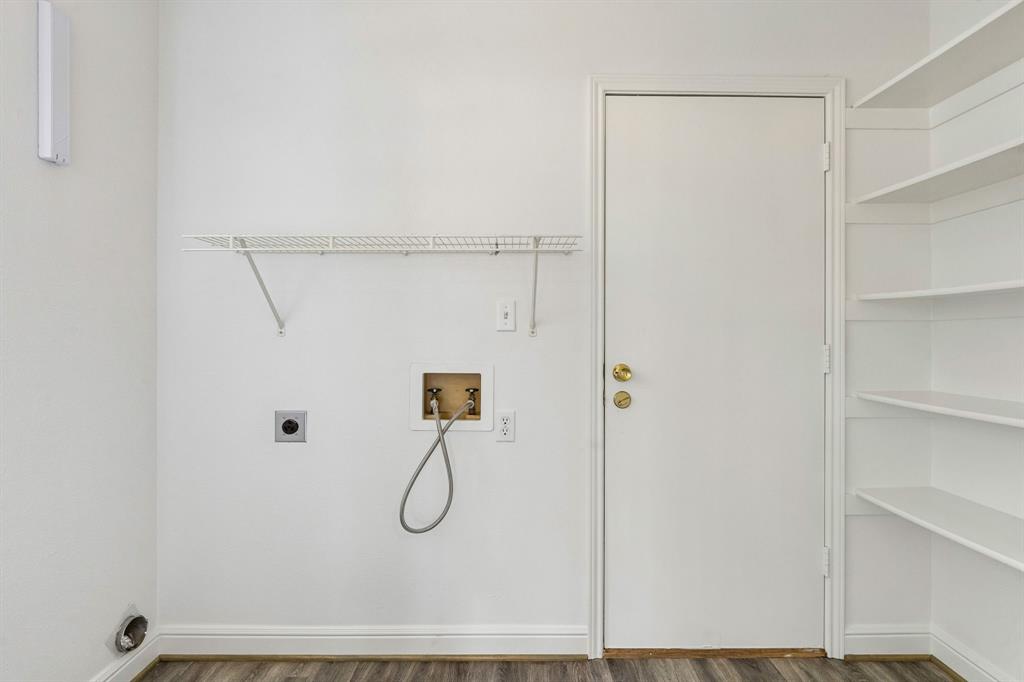 1609 Blackburn Road Sachse, TX 75048 - Photo 19 of 30 spacious utility room. The door leads out to the oversized 24x18 garage with utility sink!
