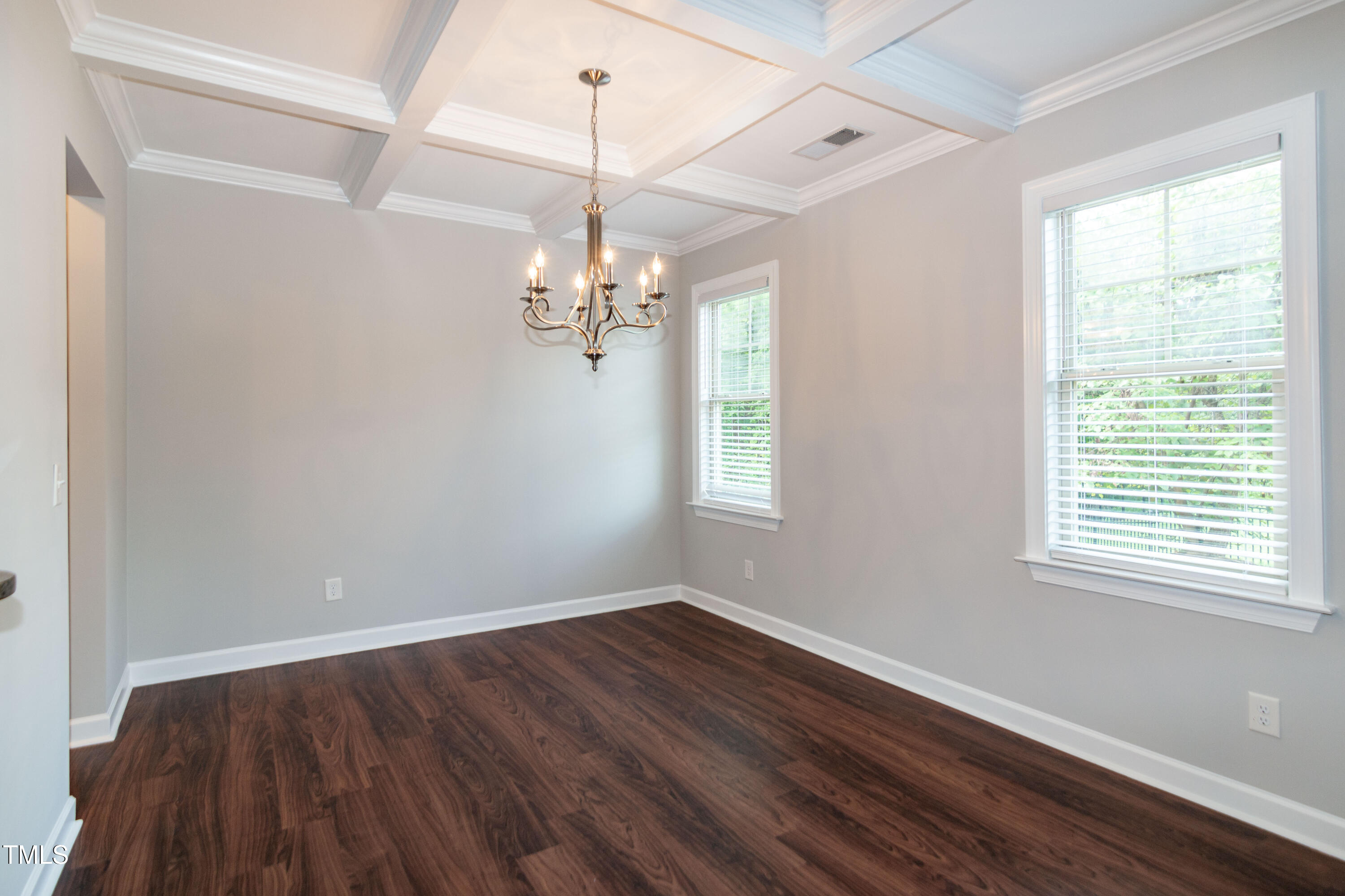 206 Roundhouse Lane Morrisville, NC 27560 - Photo 13 of 42 a view of a room with wooden floor closet and a window