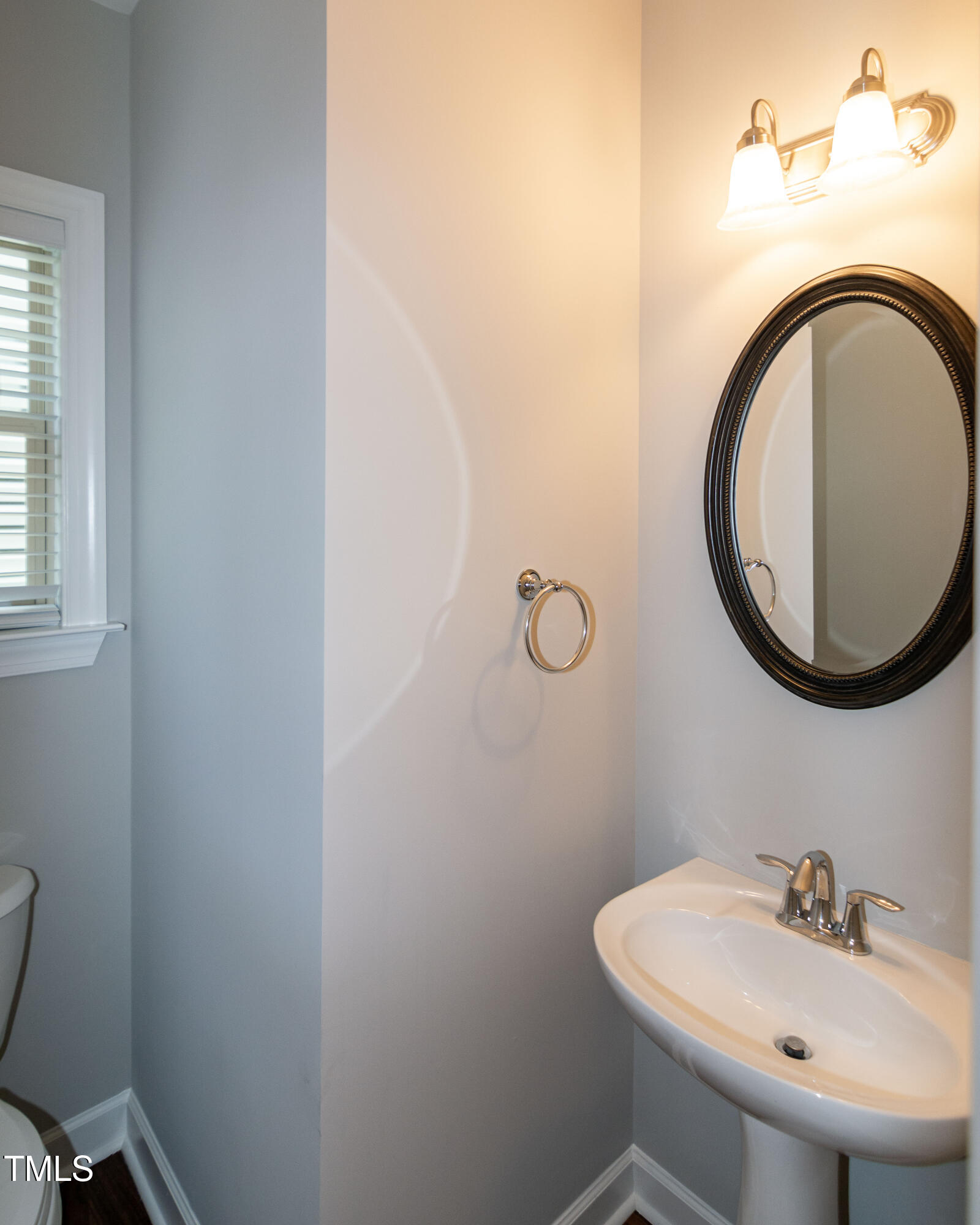 206 Roundhouse Lane Morrisville, NC 27560 - Photo 16 of 42 a bathroom with a sink mirror and toilet