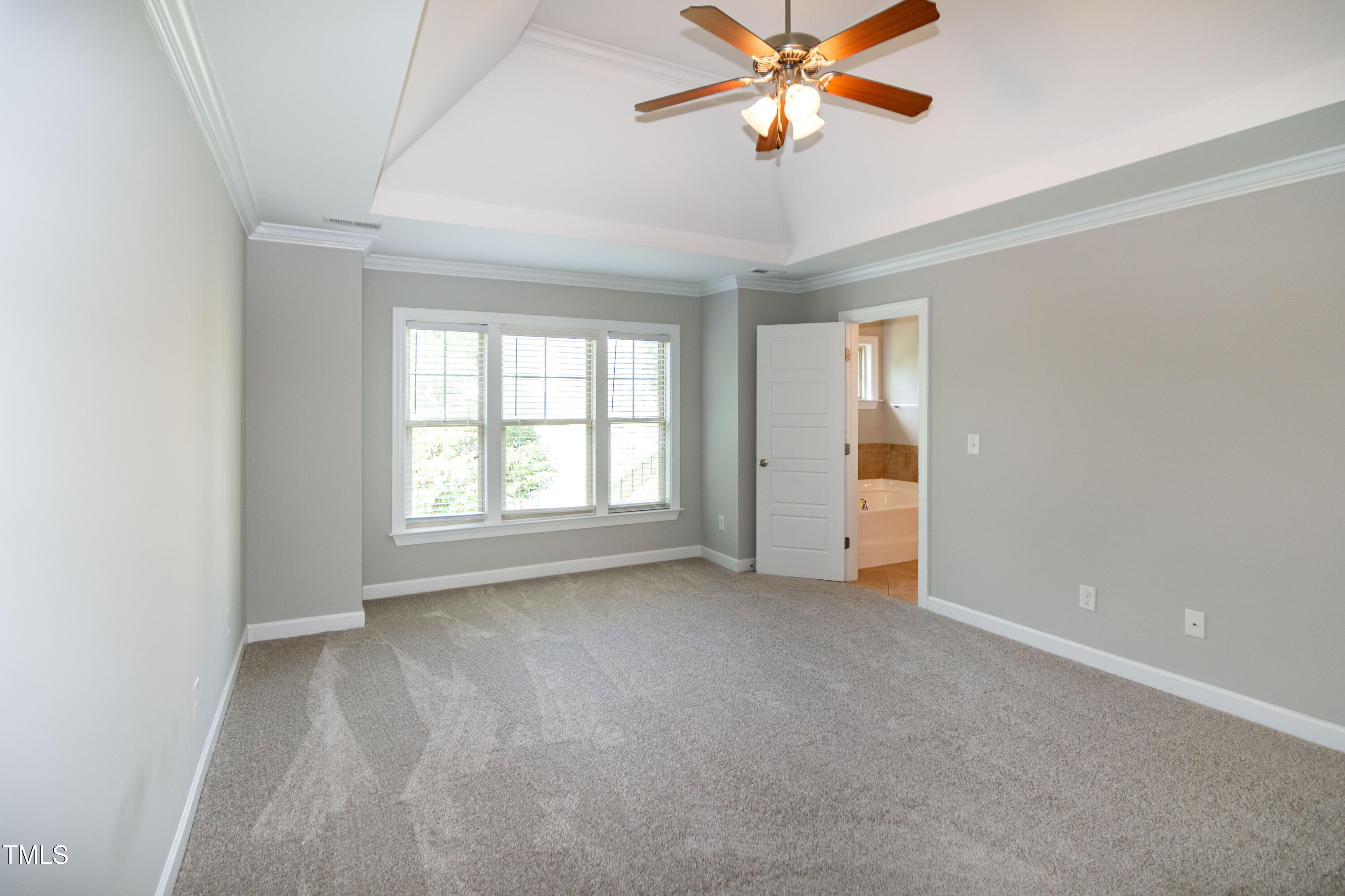 206 Roundhouse Lane Morrisville, NC 27560 - Photo 18 of 42 a view of an empty room with a window