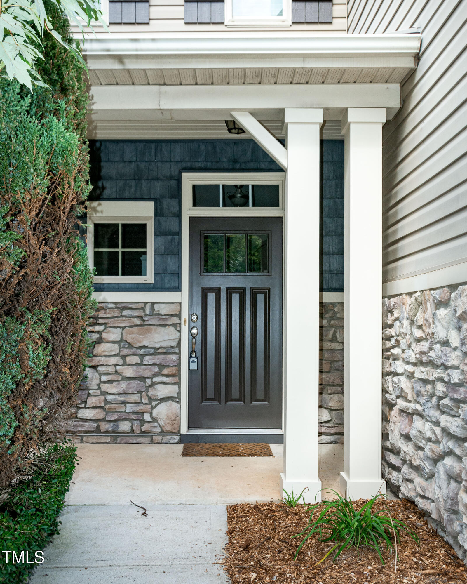 206 Roundhouse Lane Morrisville, NC 27560 - Photo 2 of 42 a front view of a house with large windows
