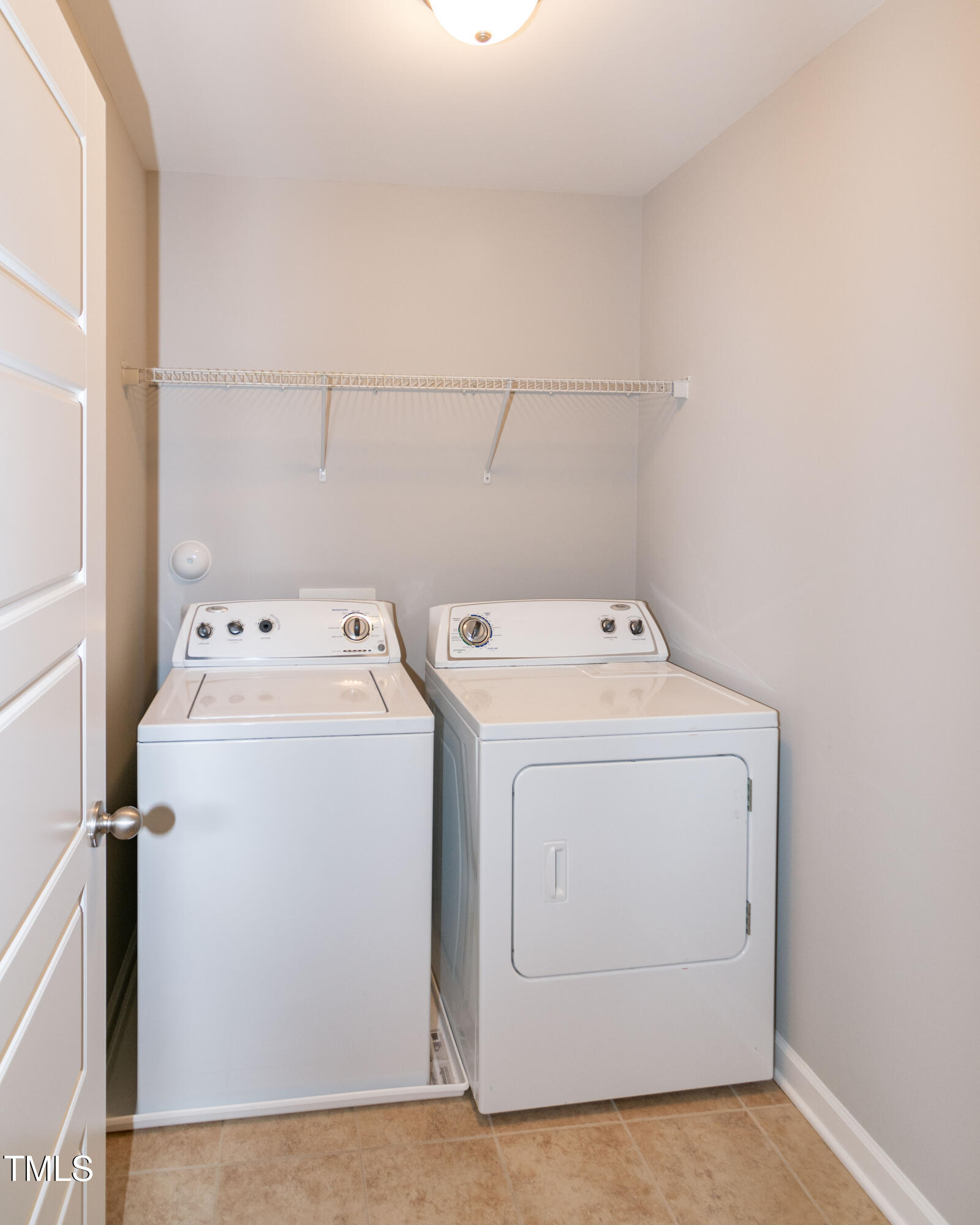206 Roundhouse Lane Morrisville, NC 27560 - Photo 26 of 42 a utility room with dryer and washer