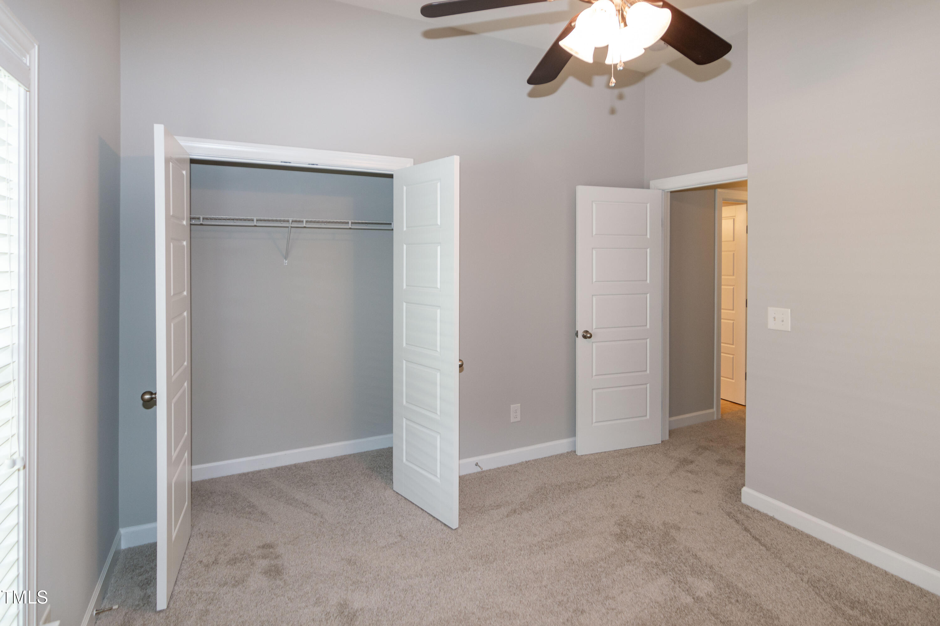 206 Roundhouse Lane Morrisville, NC 27560 - Photo 29 of 42 a view of a chandelier fan and closet area