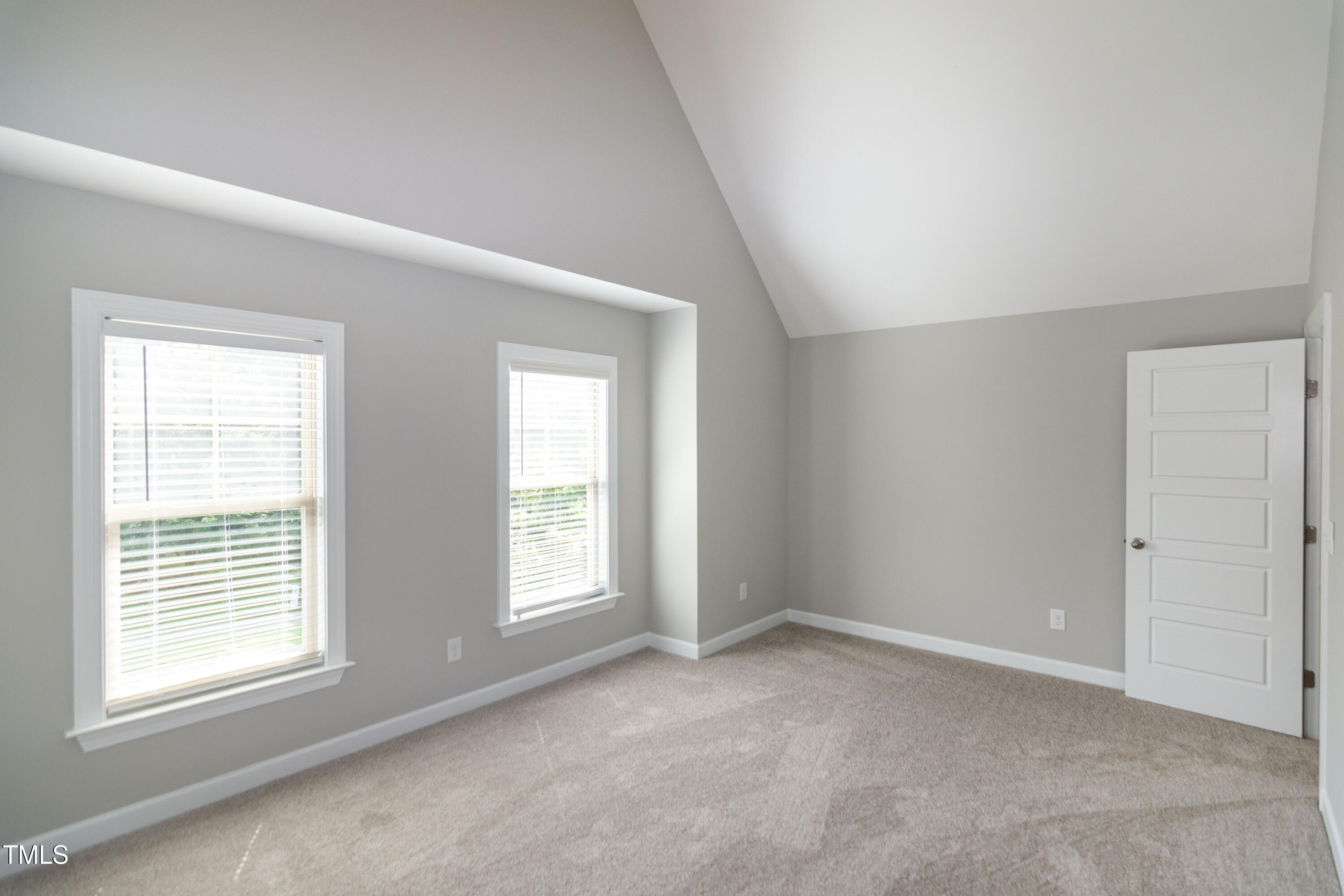 206 Roundhouse Lane Morrisville, NC 27560 - Photo 34 of 42 an empty room with a window