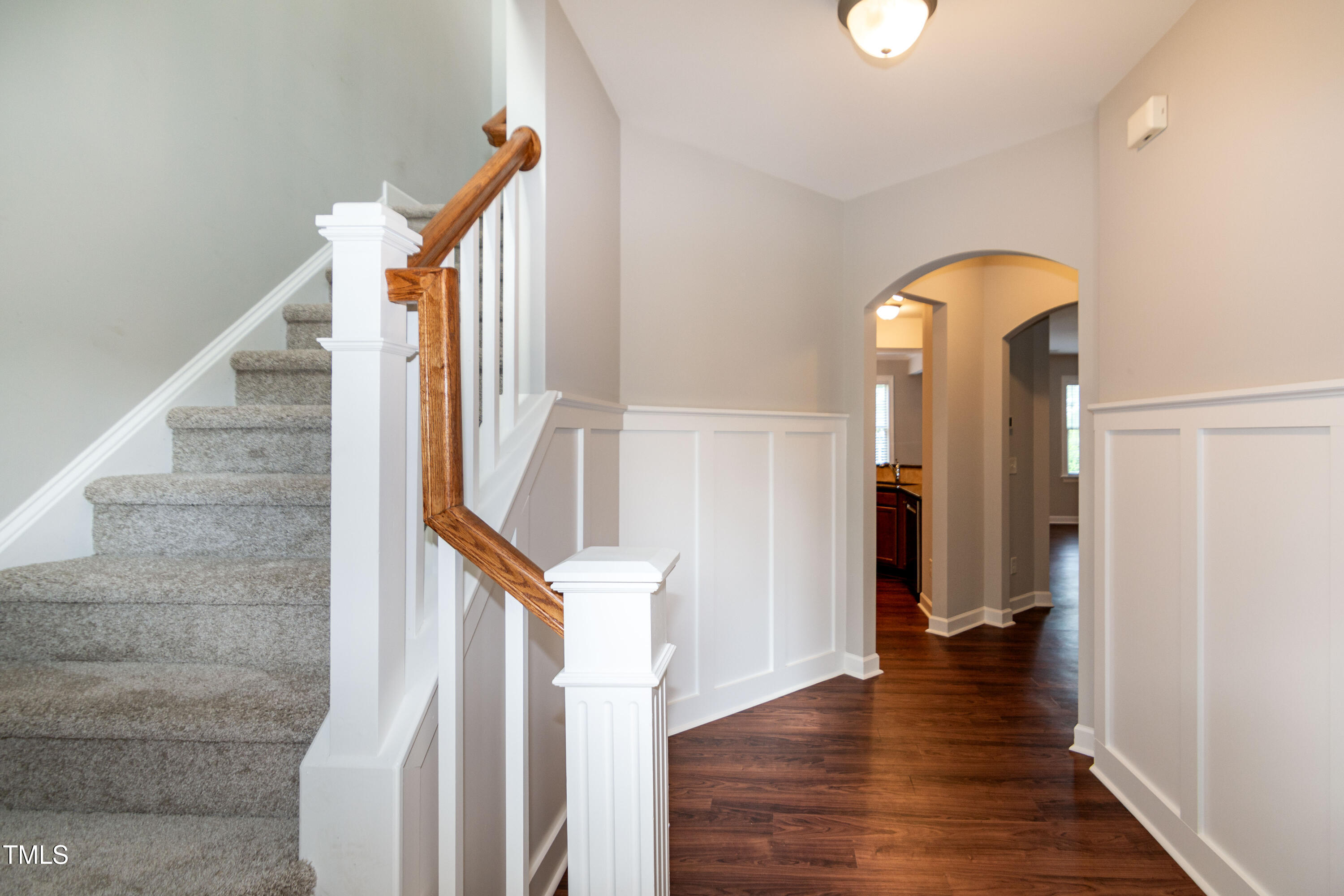 206 Roundhouse Lane Morrisville, NC 27560 - Photo 37 of 42 a view of entryway and hall with wooden floor