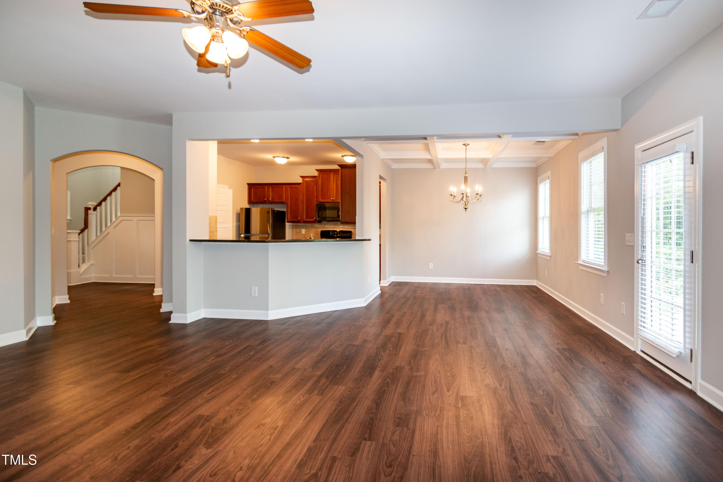 206 Roundhouse Lane Morrisville, NC 27560 - Photo 7 of 42 wooden floor in an empty room with a window