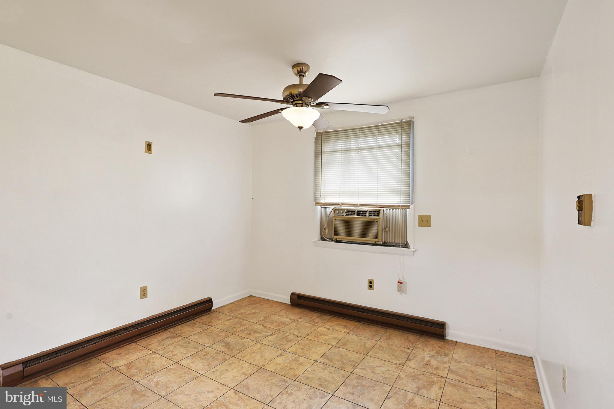 159 Rocket Center Road Keyser, WV 26726 - Photo 25 of 64 a view of a room with a ceiling fan and a rug