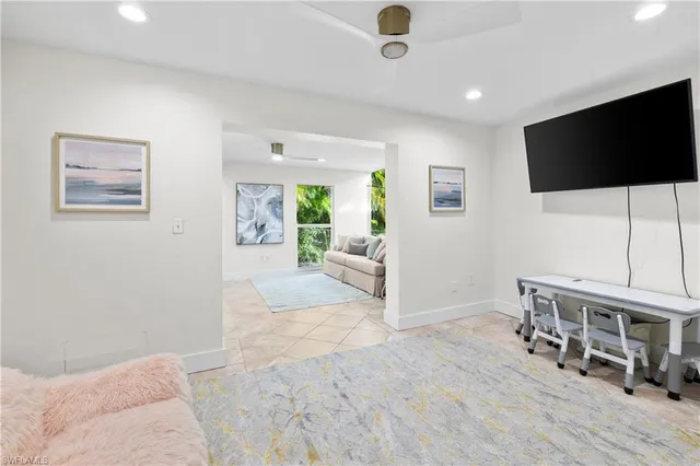 a view of livingroom with furniture and flat screen tv