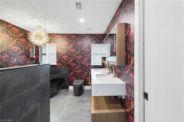 a hallway with a view of living room