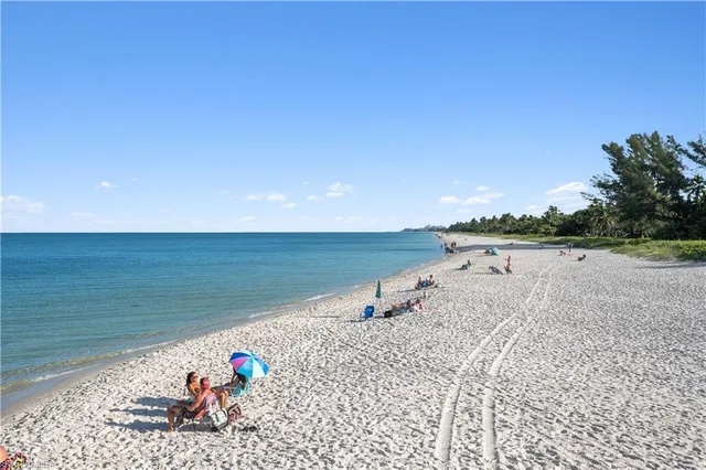 a view of a lake with a beach