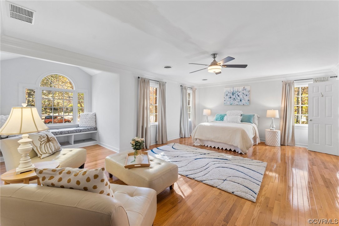 3430 Robious Forest Way Midlothian, VA 23113 - Photo 19 of 50 a bedroom with a large bed and a large window