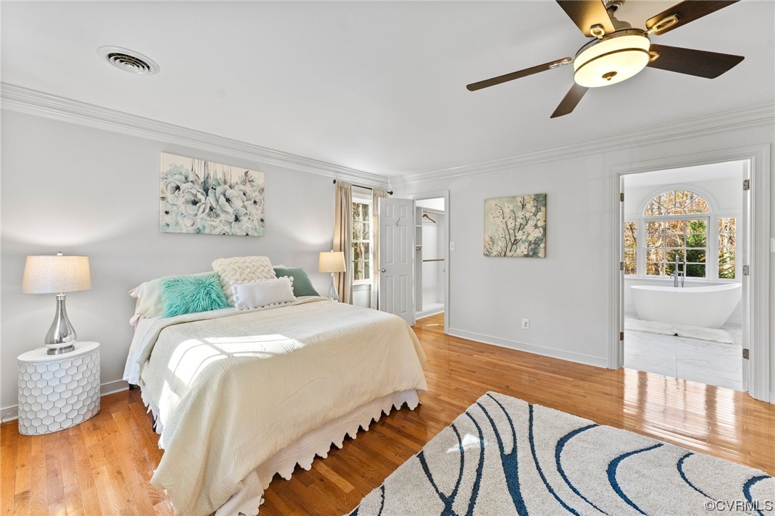 3430 Robious Forest Way Midlothian, VA 23113 - Photo 23 of 50 a bedroom with a bed and wooden floor