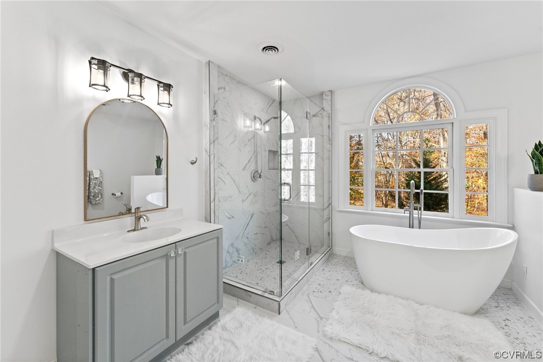 3430 Robious Forest Way Midlothian, VA 23113 - Photo 25 of 50 a spacious bathroom with a tub sink and a mirror