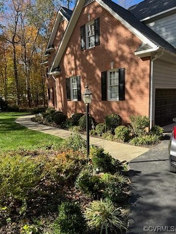 3430 Robious Forest Way Midlothian, VA 23113 - Photo 3 of 50 a view of a house with a yard