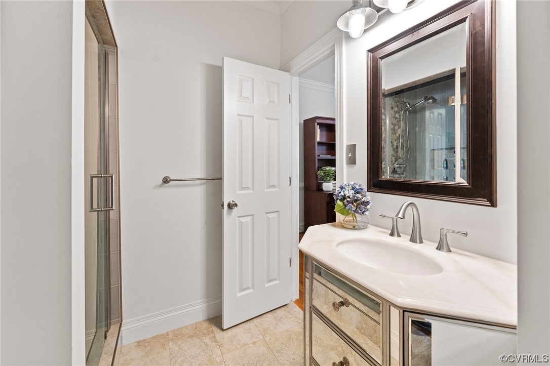 3430 Robious Forest Way Midlothian, VA 23113 - Photo 36 of 50 a bathroom with a sink vanity and a mirror